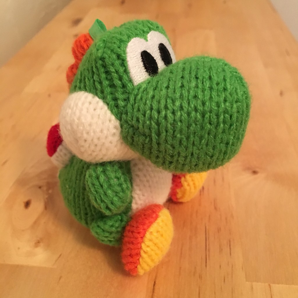 Bundled knitted Yoshi Amiibo